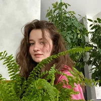 Milana With a Plant